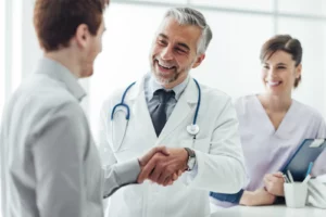 Preventive Care. Doctor holding digital tablet at meeting room